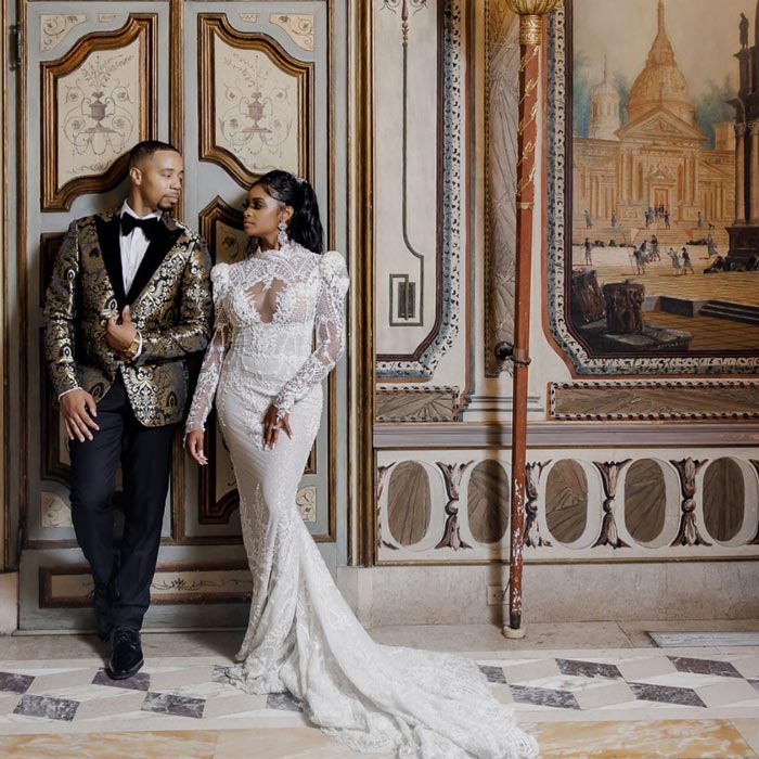 bride and groom in ornate hallway