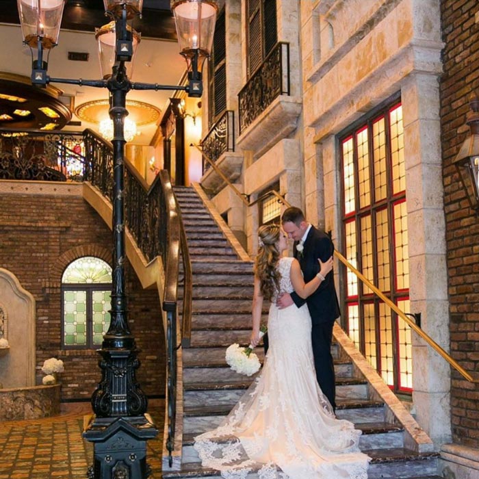 bride and groom on staircase